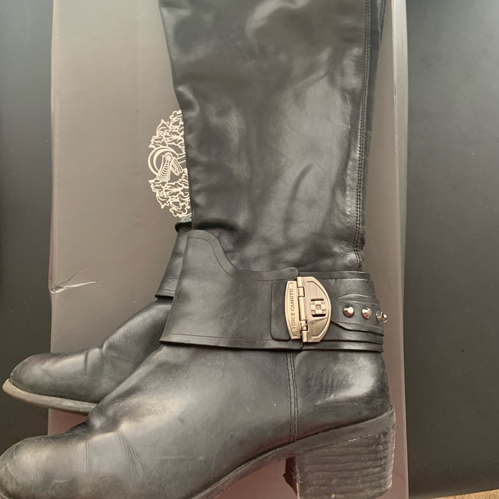 Black Leather knee boots.